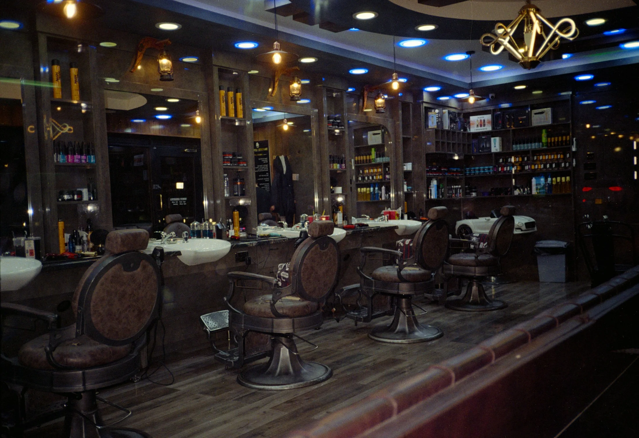 Barbershop interior with chairs and mirrors