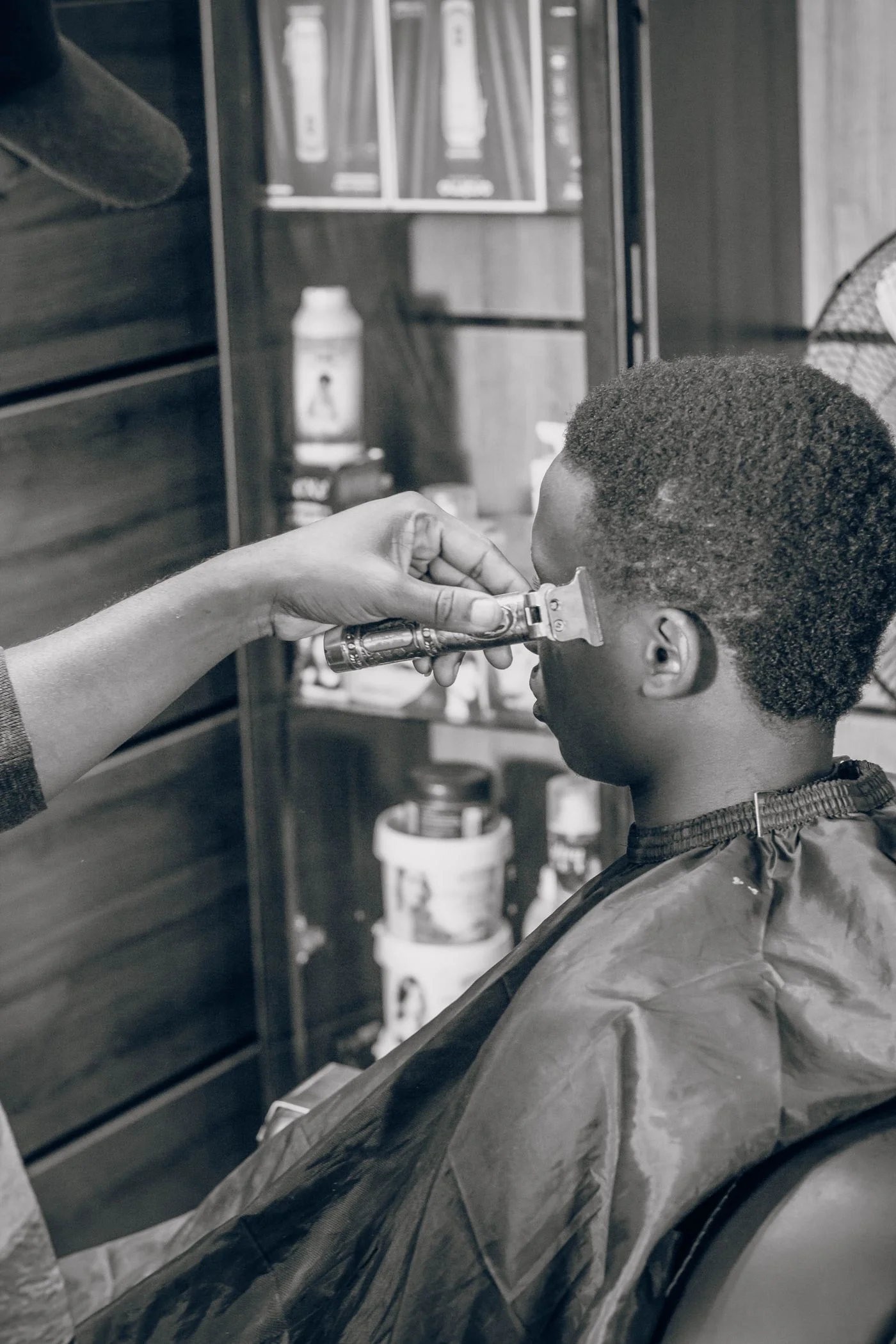 Close-up of a haircut in progress